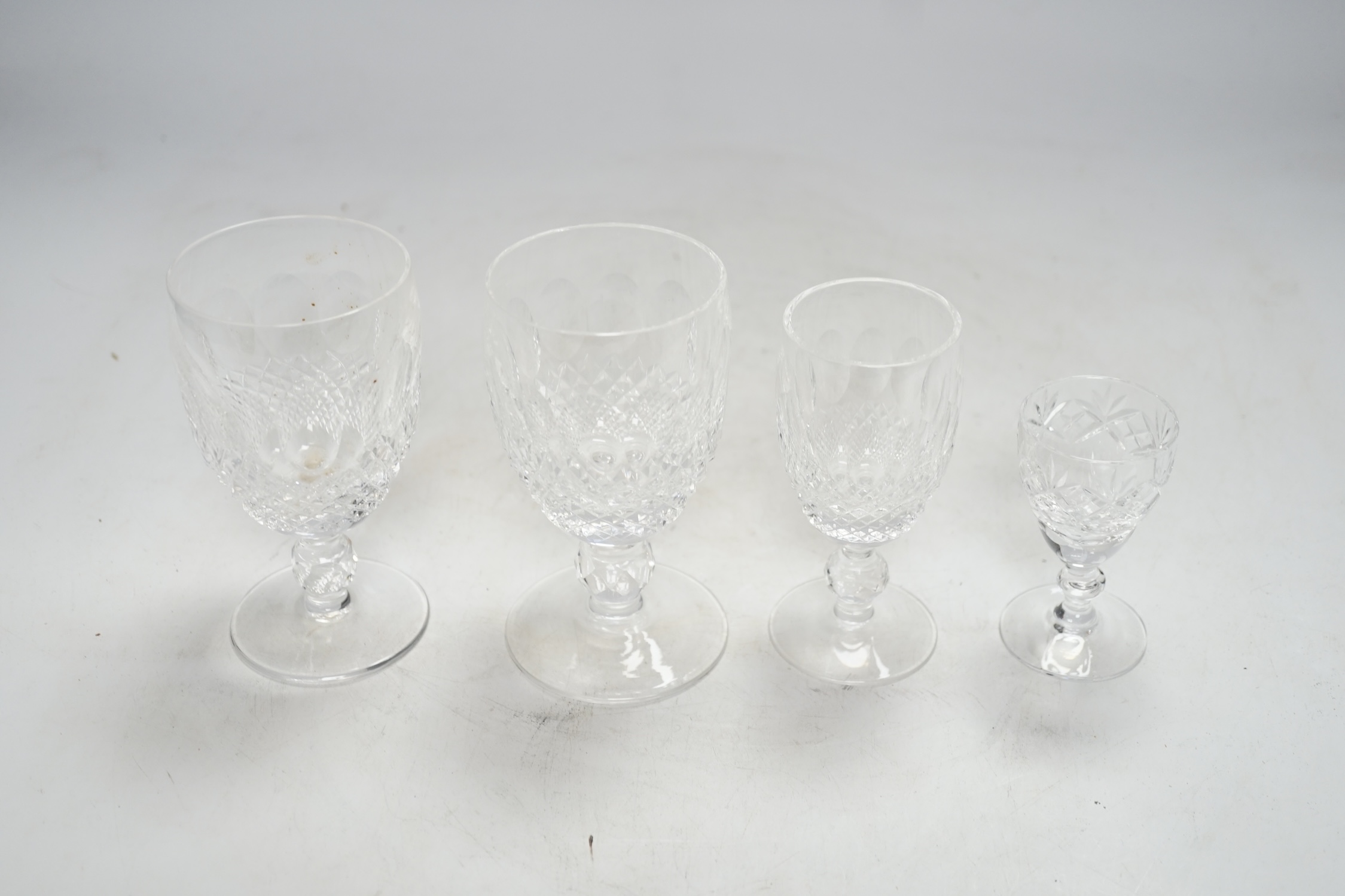 A small collection of Waterford crystal and other cut glass drinking glasses, highest 12cm, (18)